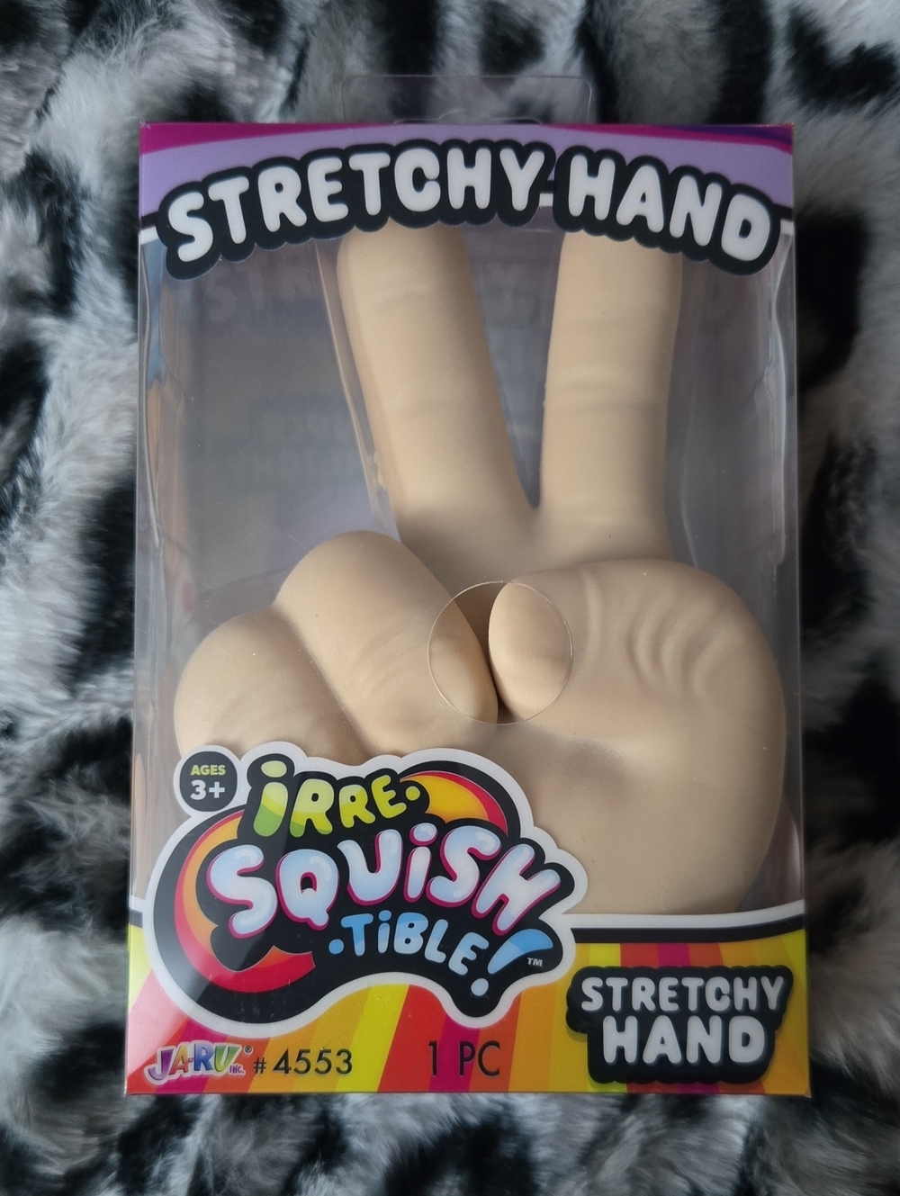 Stretchy Hand - Beige Peace Sign Toy